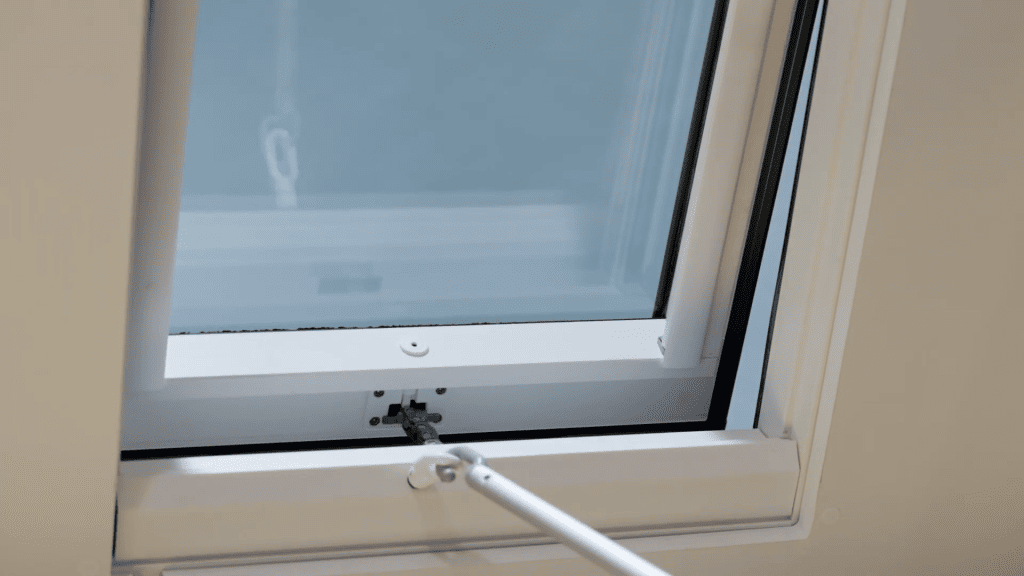 Open Velux Venting Skylight With A Pole